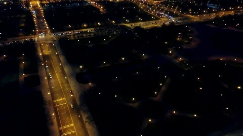 Tilting up aerial shot of Chicago Millenium Park skyline at night. 4K 스톡 동영상 124213413