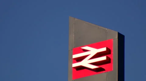 Tilting Up and Down Over Train Station Sign Stock Footage 61638050