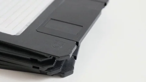 Tilting on black diskette data archives stacked Stock Footage 75771457