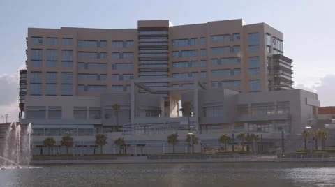 Tilting down on a business center building in Malta Stock Footage 65387722