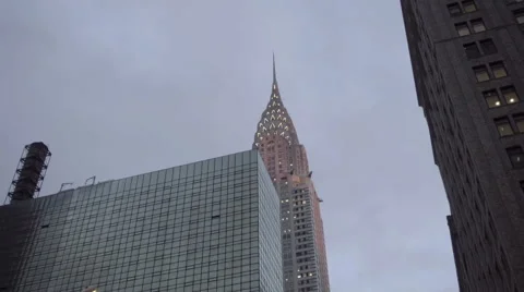 Tilting down Chrysler Building lights night Grand Central Terminal holidays NYC Vídeos de archivo 58845236
