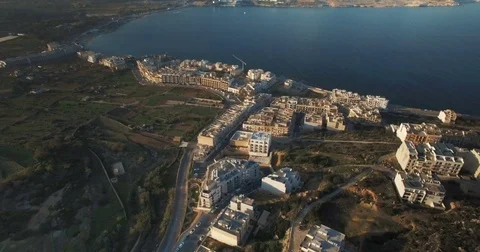Tilting down over a rural city in Malta Stock Footage 71097901