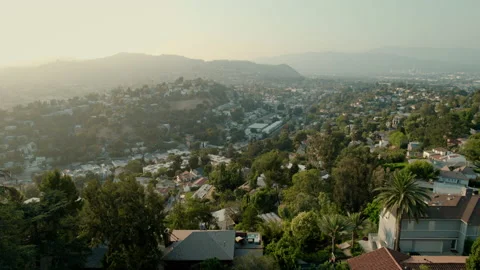 Tilting down over Silver Lake hills on nice housing Stock Footage 168218730