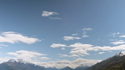 Tilting down shot of clear alpine lake, Queenstown, New Zealand Stock Footage 89572874