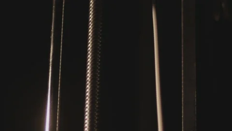 Tilting on moving mechanisms of 3D printer working and printing. Close up. Stock Footage 145899623