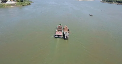 Tilting up from old dredging barges side... | Stock Video | Pond5