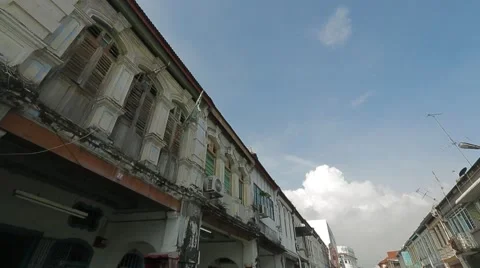 Tilting Shot from Blue Sky to A Small Street in Penang Stock Footage 48139667