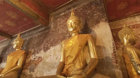 Tilting Up Shot of Buddha Statues Sitting at Wat Suthatthepwararam Temple Stock Footage 100401267