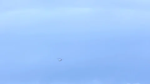Tilting Shot of a Helicopter in the Background Video stock 93166028