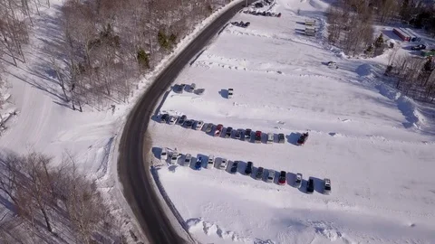 Tilting up Snowy Mountain Road Stock Footage 129456829