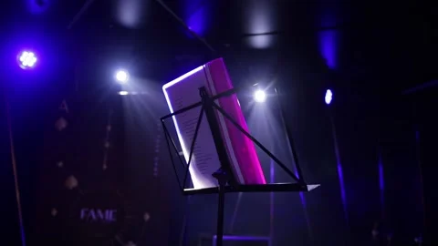 Tilting table-stand for music on stage with lighting before the performance Stock Footage 300342153