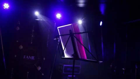 Tilting table-stand for music on stage with lighting before the performance Stock Footage 300868638
