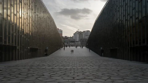 Tilting up time lapse of people walking in Ehwa  Stock Footage 228975642