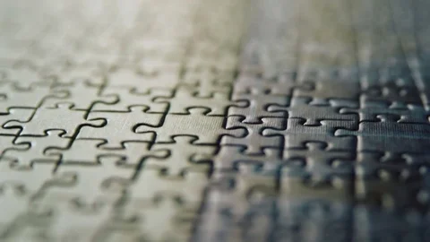 Tilting from unfocused complete puzzle to focused and to unfocused again Stock Footage 73441405