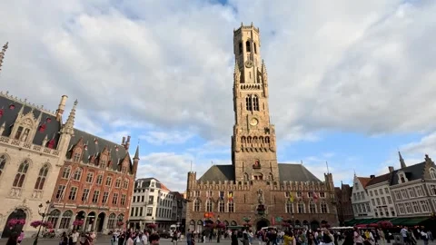 Tilting View of Belfry Tower and Bruges City Square 動画素材 315546049