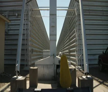Tilts up shot of grain elevator Stock Footage 21590922