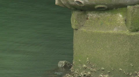 Tiltup on river bridge column with relief figure Stock Footage 65781233
