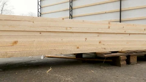 Timber for construction stacked on construction site Stock Footage 246630070