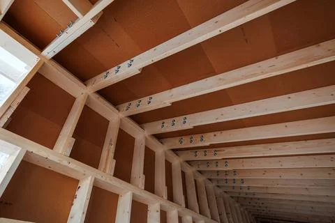 Timber Frame Ceiling With Exposed Trusses and Structural Screws Stock Photos