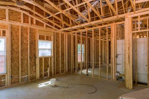 Timber frame house stick built home under construction new build with wooden Stock Photos