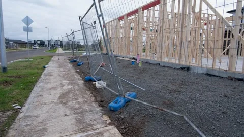 Timber-framed house under construction in a suburban neighborhood in Australia Stock Footage 312377303