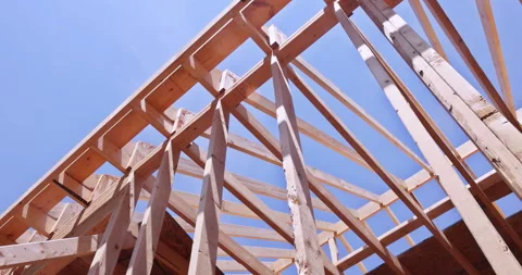 Timber framing. Construction detail with structural wooden beams. Stock Footage 309787342