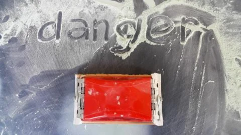 Timber for grinding, plastic, placed on the hood of the car and the top finger Stock Photos
