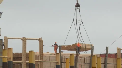 Timber loaded onto a ship Stock-Footage 1084748