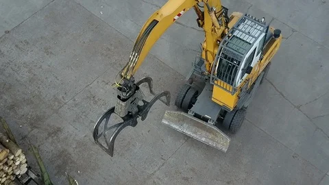 Timber loader at wood processing plant, aerial view Stock Footage 113073605