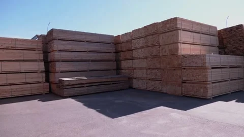 Timber mill. sawmill: storage of planed wooden boards Video stock 330348564