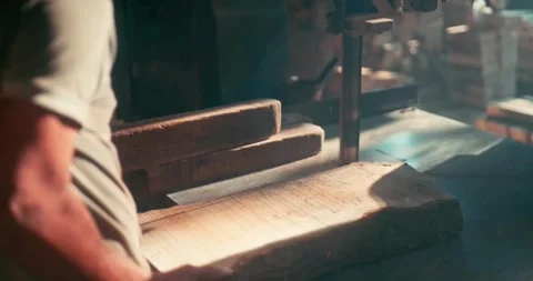 Timber Mill with Workers Cutting and Shaping Wood Stock Footage 320944699