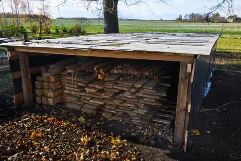 Timber storage. How to store timber at home. Stock Photos