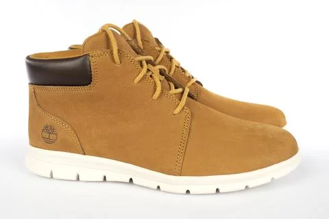 Timberland Graydon Chukka Basic leather boots in yellow color isolated on whi Stock Photos