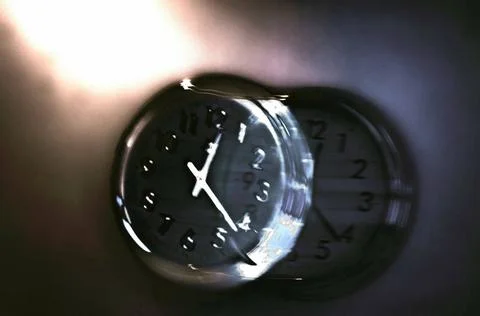 Time 2 A clock with an effect of movement giving the idea of a new dimensi... Stock Photos