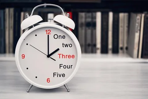 Time 2 two or 14 fourteen hours on a desk clock Stock Photos