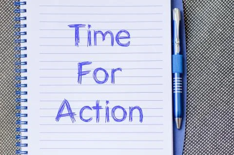 Time for action write on notebook Stock Photos