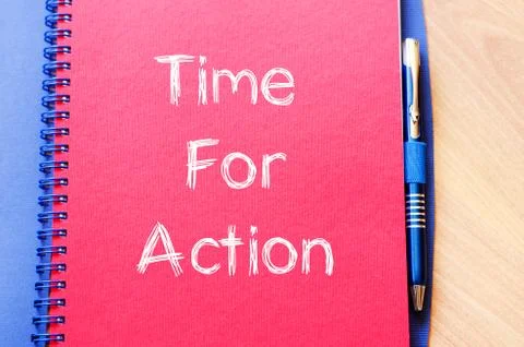 Time for action write on notebook Stock Photos
