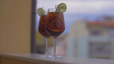 Time for a break. Refreshing Cocktail Sangria with Fruits and Ice Vidéo 110027719