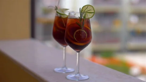 Time for a break. Refreshing Cocktail Sangria with Fruits and Ice Video stock 110036208