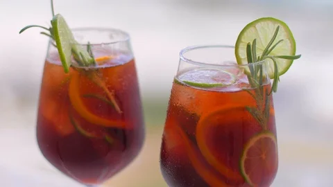 Time for a break. Refreshing Cocktail Sangria with Fruits and Ice Video stock 110045716