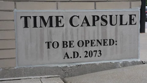 Time capsule stone plaque with opening date A.D. 2073 Video stock 338119369