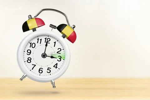 Time change in Belgium, spring forward. Summer time concept, over white Stock Photos
