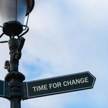 TIME FOR CHANGE directional sign on guidepost Stock Photos