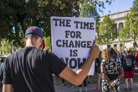 "The time for change is now" Stock Photos