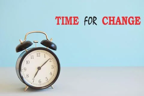 Time to change text on clock.Time concept. Stock Photos