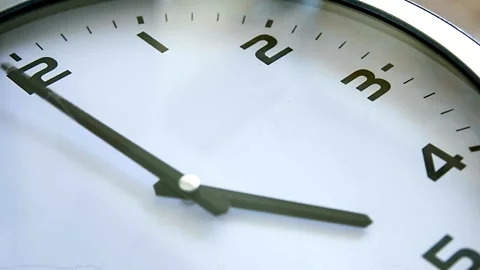 Time clock closeup background macro watch minute deadline white alarm hour Stock Footage 336445089