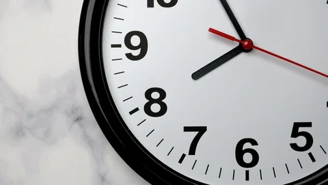 The Time On The Clock Eight. Black Clock With The Red Arrow Running In The Backg 스톡 동영상 128711624