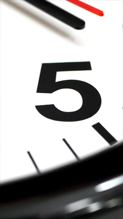 The Time On The Clock Five. Wall Clock Showing Passing Minutes. Vertical Video stock 277422365