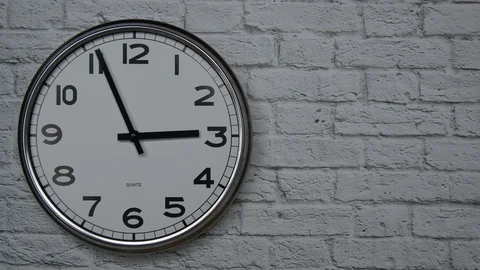 The Time On The Clock Three. Clock With The Black Arrows With The Arabic Numeral Stock Footage 128857022