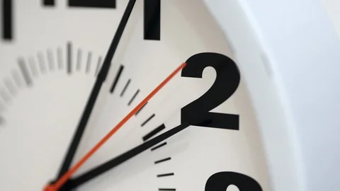 The Time On The Clock Two. Clock With The Red Arrow Running Stock Footage 105597264